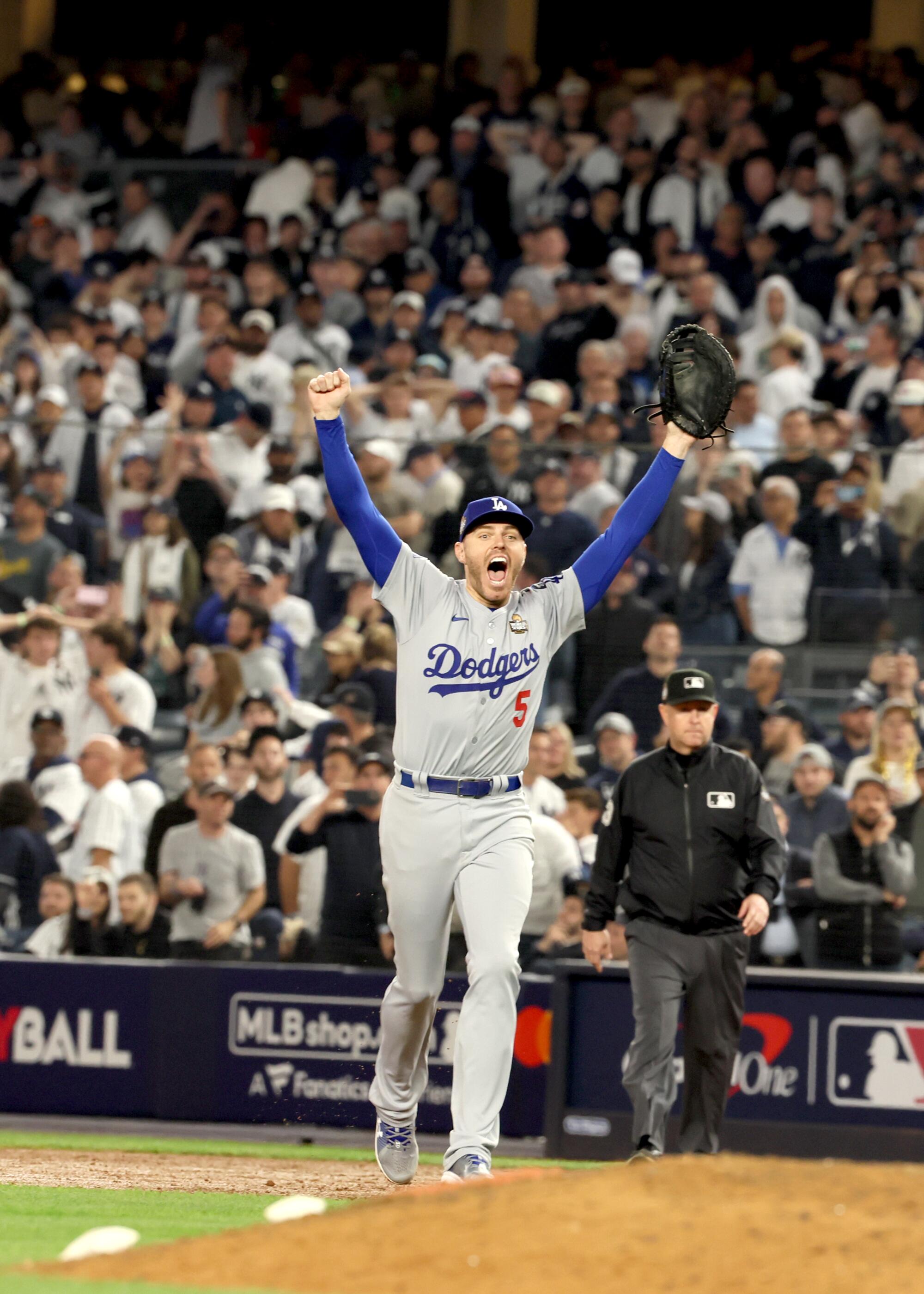 World Series MVP Dodgers first baseman Freddie Freeman celebrates.