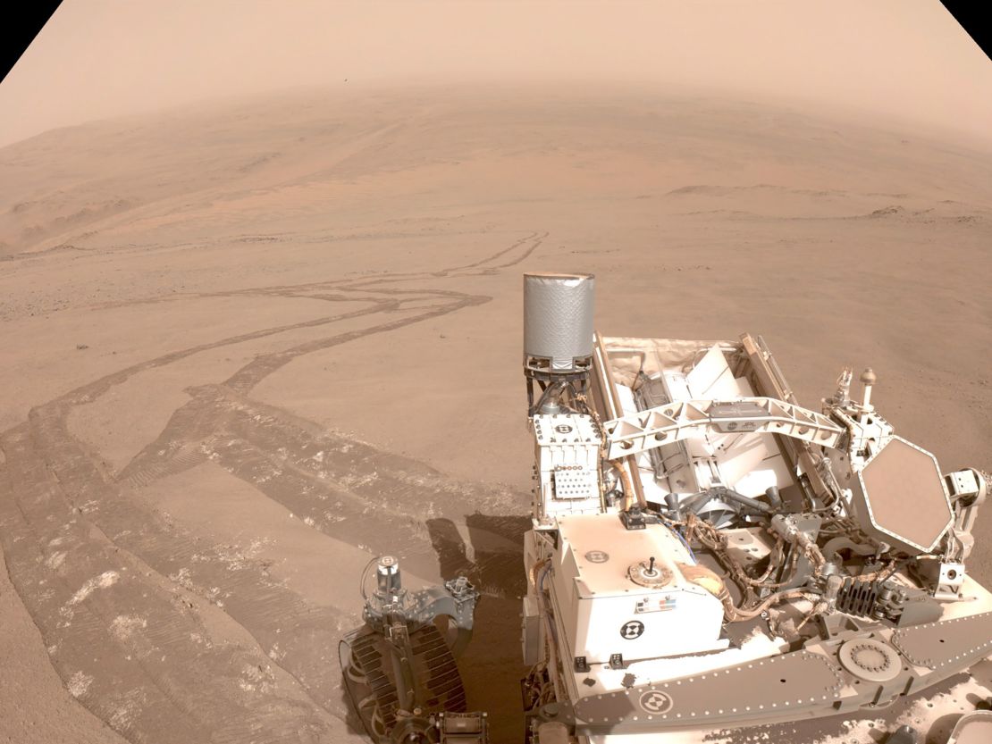 Rover tracks, photographed by one of Perseverance's navigation cameras on October 11, show the slipperiness of Mars' terrain as the rover ascends the rim of Jezero Crater.