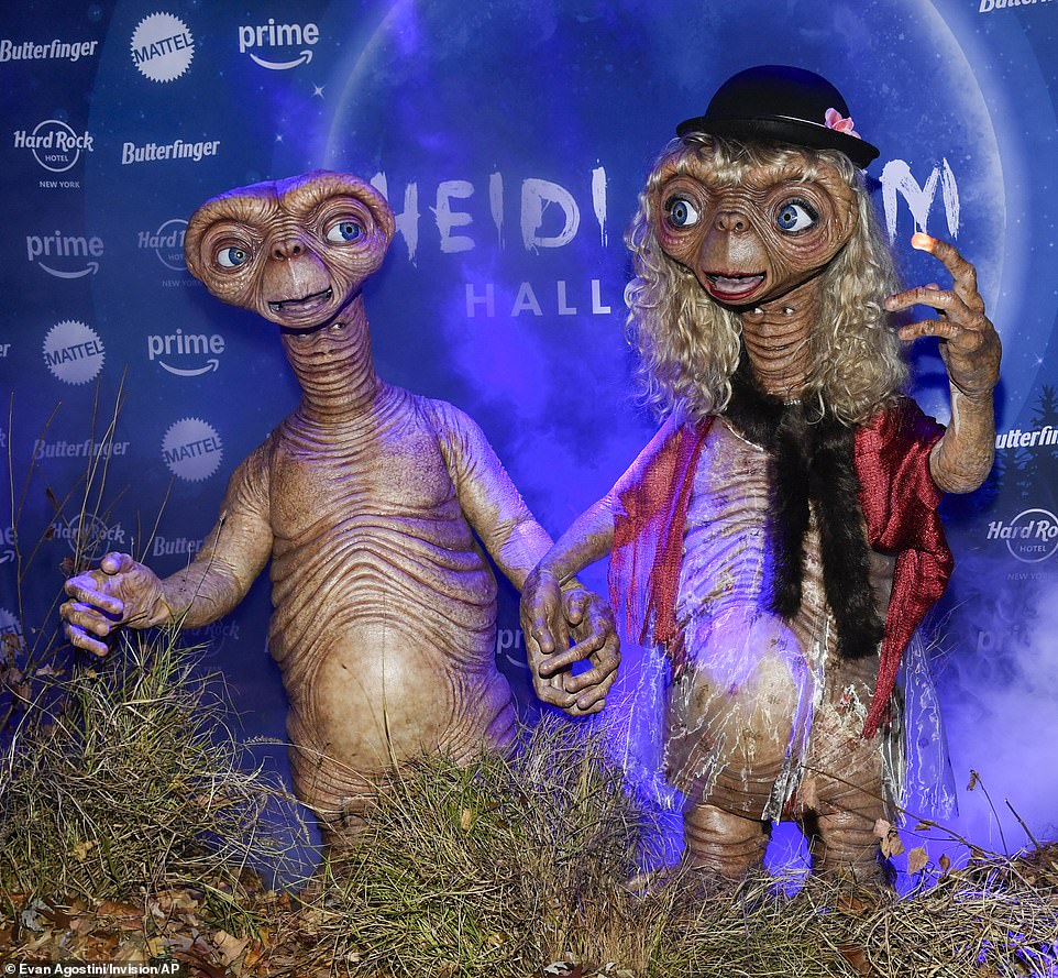 On October 31, the supermodel, 51, made her grand arrival at her famous, annual Halloween soirée alongside the musician, 35, dressed as the alien from the 1982 cult classic movie, E.T. the Extra-Terrestrial